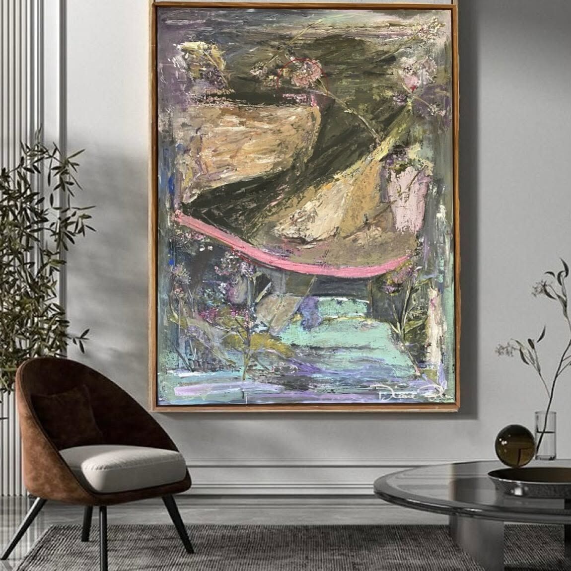 A large framed painting in a calm room