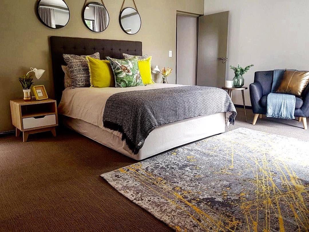 Bedroom with round mirrors